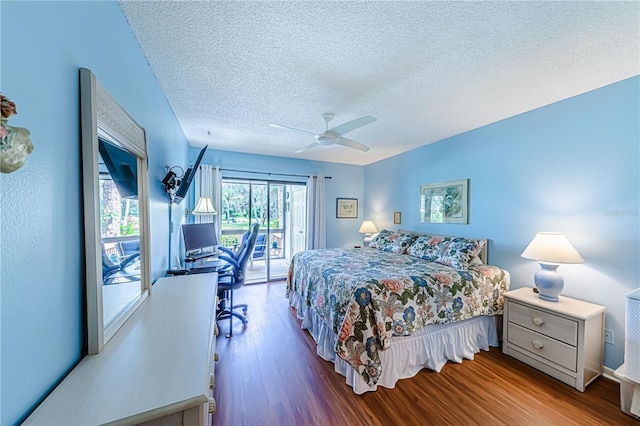 bedroom featuring a textured ceiling, access to exterior, ceiling fan, and hardwood / wood-style flooring