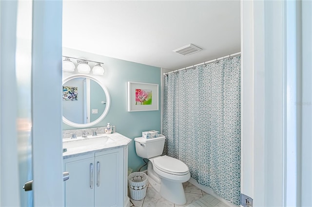 bathroom with vanity, toilet, and a shower with curtain