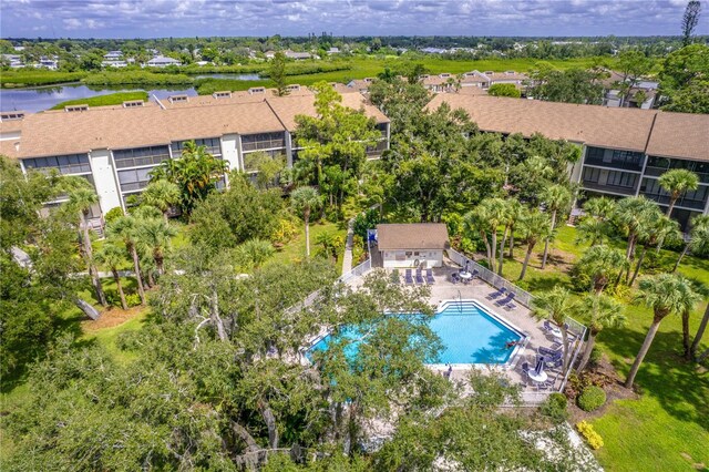 birds eye view of property featuring a water view