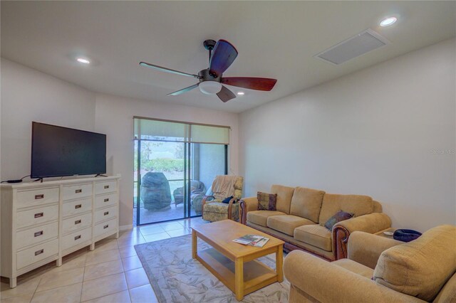 living room featuring light tile patterned flooring, recessed lighting, and a ceiling fan