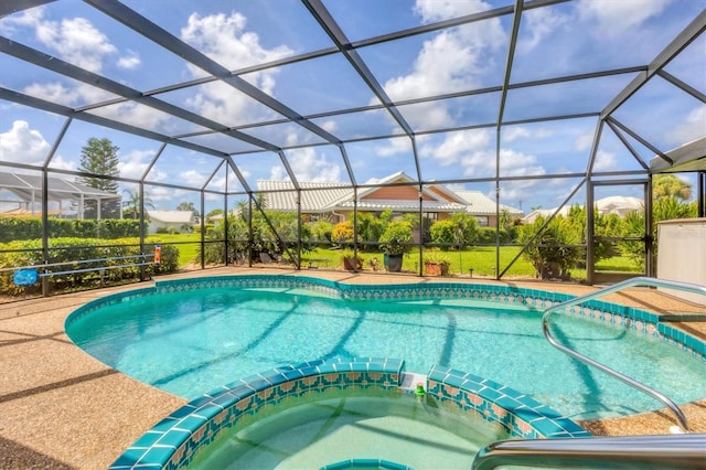 view of swimming pool with glass enclosure