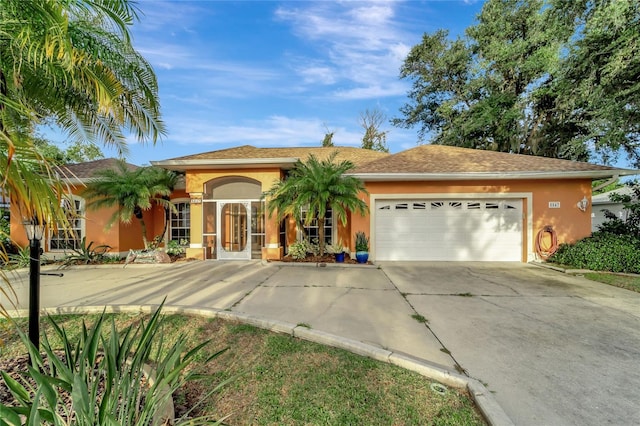 single story home featuring a garage