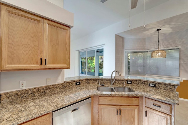 kitchen featuring dishwasher, ceiling fan, light stone counters, light brown cabinetry, and a sink