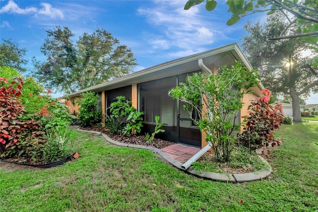 exterior space featuring a sunroom