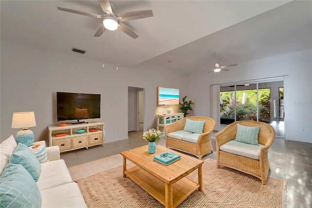 living room with visible vents, vaulted ceiling, and a ceiling fan