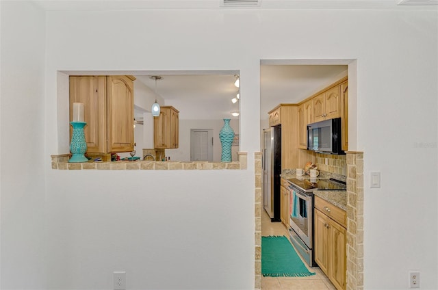 kitchen featuring pendant lighting, tasteful backsplash, light tile patterned floors, light brown cabinetry, and appliances with stainless steel finishes