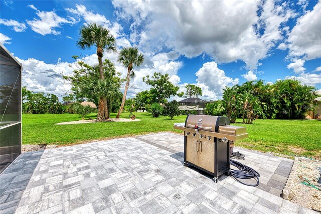 view of patio with a grill