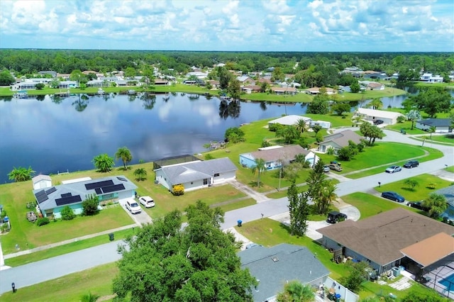 drone / aerial view with a water view