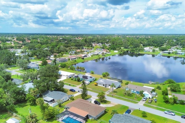 bird's eye view with a water view