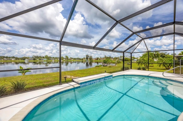 view of pool with a lanai, a lawn, and a water view