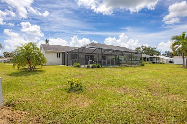 view of yard featuring a lanai