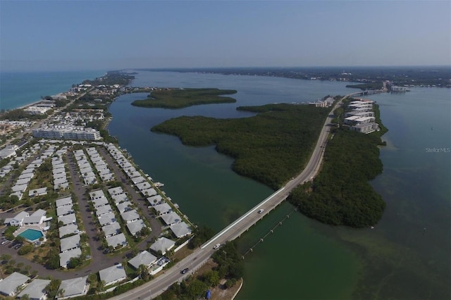 drone / aerial view with a water view