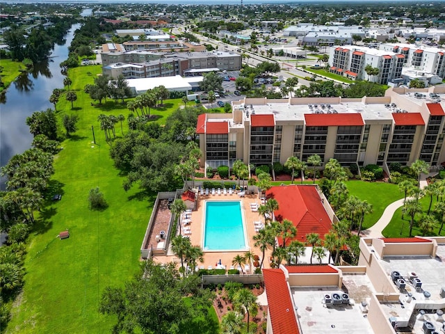 birds eye view of property featuring a water view