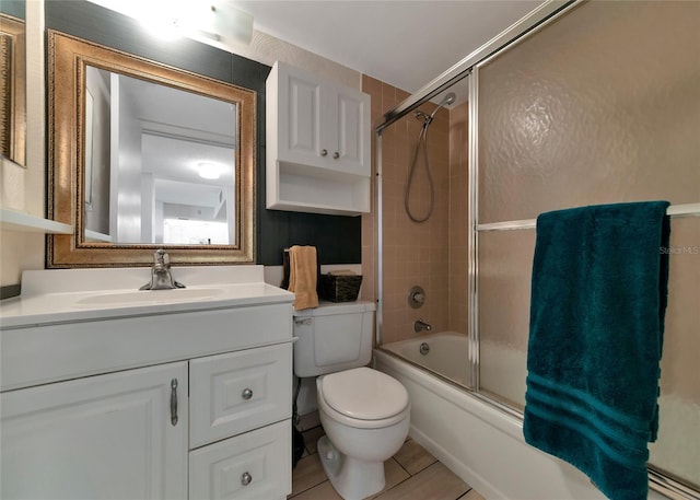 full bathroom with vanity, toilet, and enclosed tub / shower combo