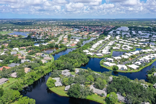 drone / aerial view featuring a water view