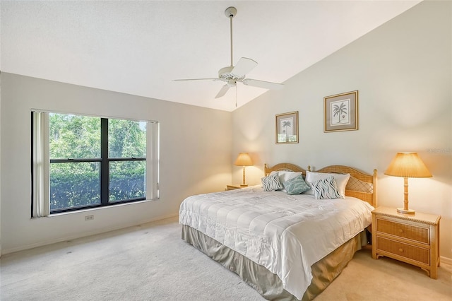 carpeted bedroom with lofted ceiling and ceiling fan