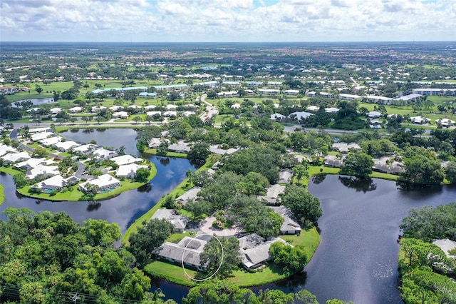 aerial view featuring a water view and a residential view