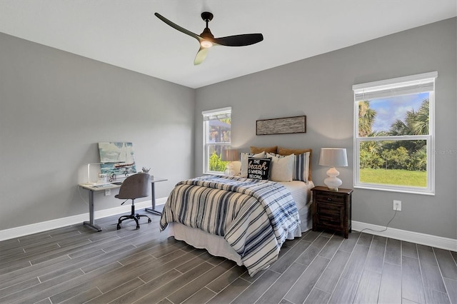 bedroom featuring ceiling fan and dark hardwood / wood-style floors