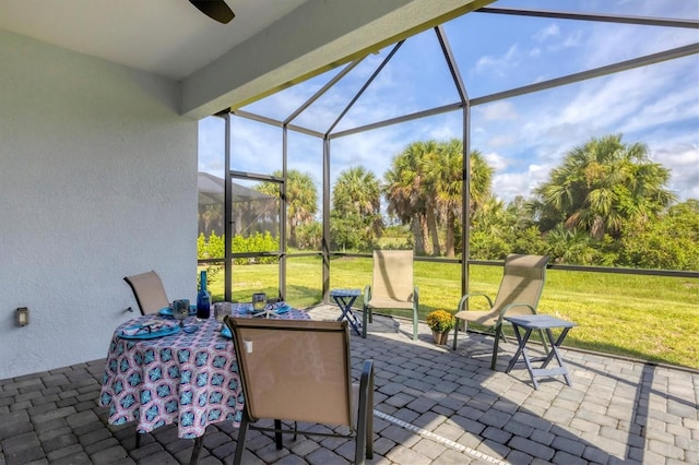 exterior space with ceiling fan