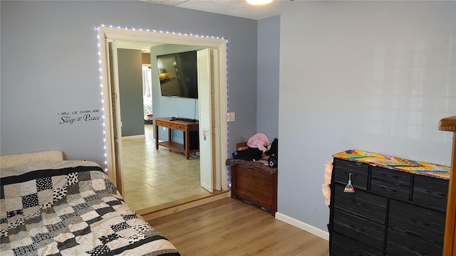 bedroom featuring light hardwood / wood-style flooring