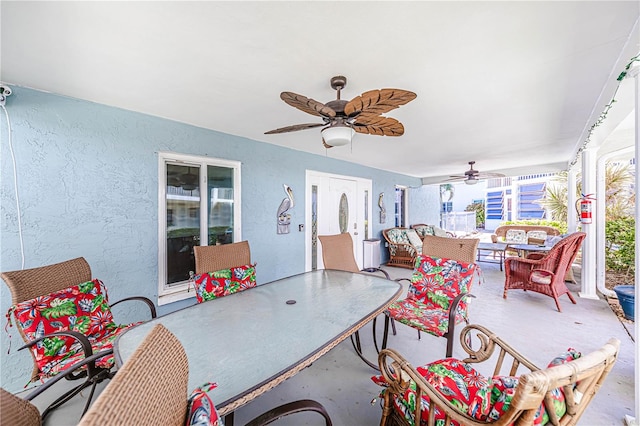 view of patio / terrace with ceiling fan and an outdoor hangout area