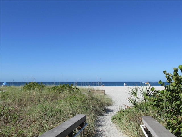 property view of water featuring a view of the beach