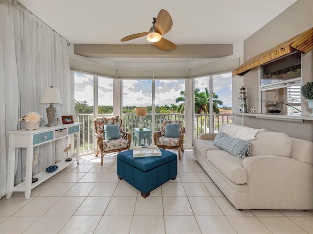 tiled living room featuring floor to ceiling windows and ceiling fan