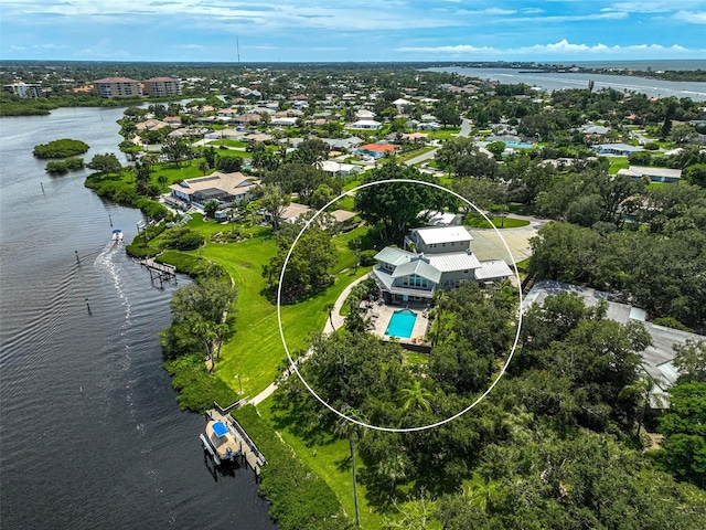 birds eye view of property featuring a water view