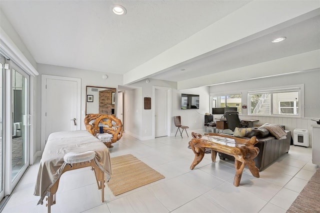 living room with light tile patterned flooring