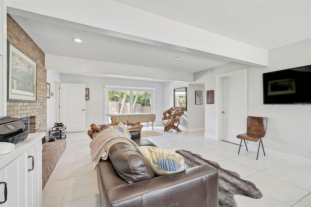 tiled living room with a fireplace