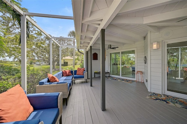 wooden terrace featuring an outdoor hangout area