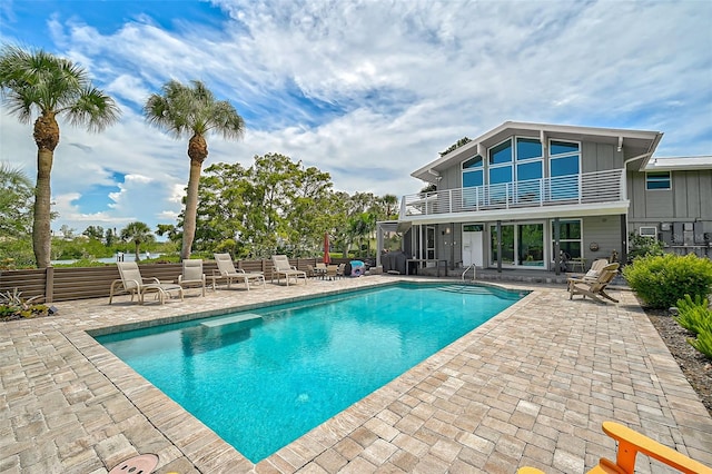 view of pool featuring a patio