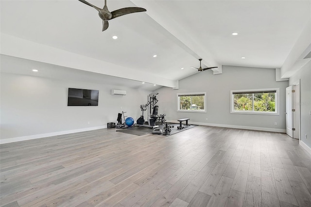 exercise area featuring vaulted ceiling, a wall unit AC, ceiling fan, and light hardwood / wood-style floors