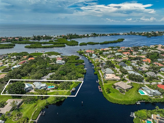 bird's eye view with a water view