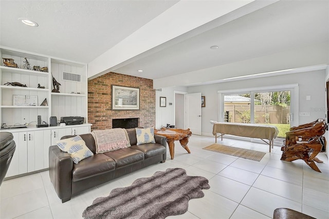 tiled living room with a fireplace and beam ceiling