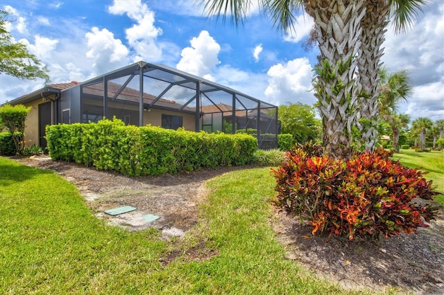 view of yard with a lanai