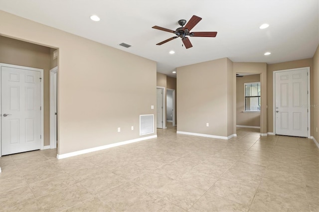 unfurnished room with ceiling fan