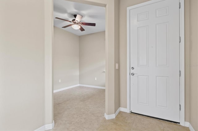 foyer featuring ceiling fan