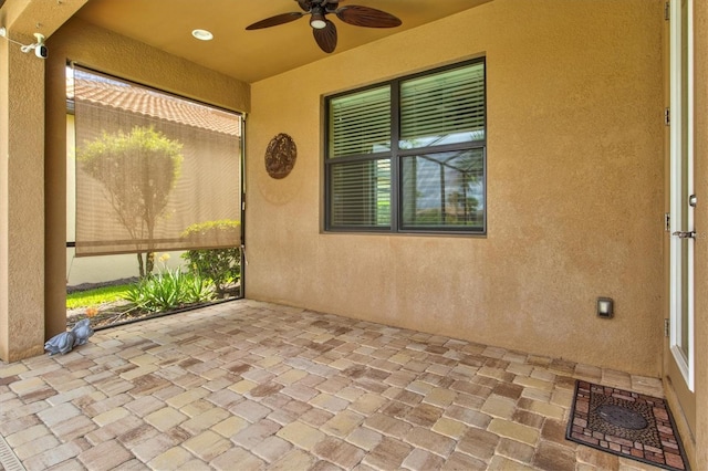 view of patio / terrace featuring ceiling fan