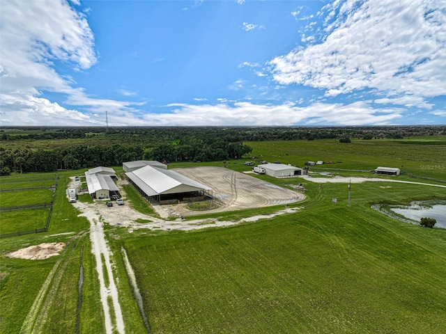 birds eye view of property with a rural view