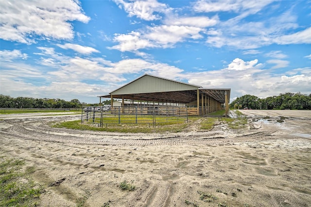 view of outbuilding with a rural view