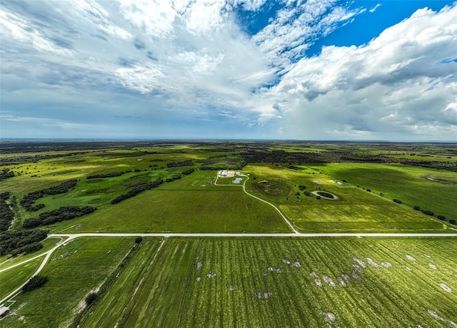 birds eye view of property featuring a rural view