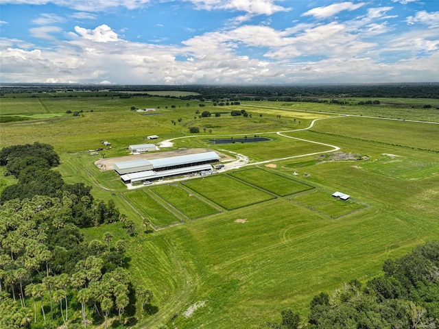 birds eye view of property with a rural view