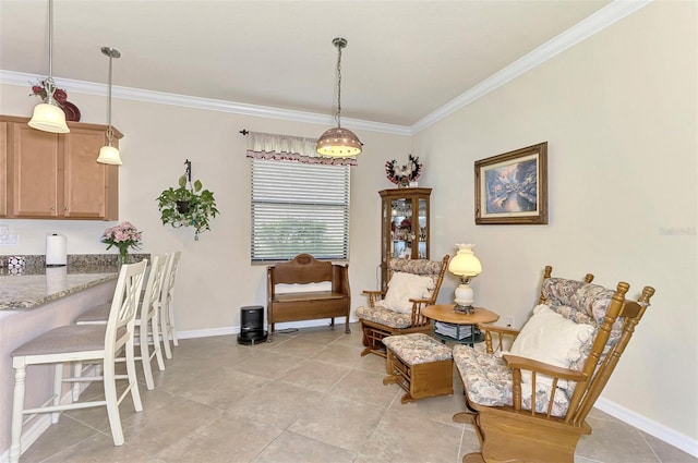 living area featuring ornamental molding and light tile patterned floors