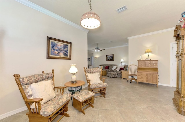 sitting room featuring ceiling fan and ornamental molding