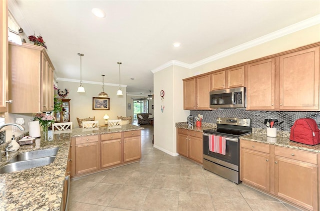 kitchen with light stone counters, stainless steel appliances, ornamental molding, and sink