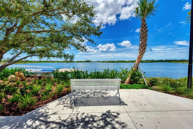 view of patio featuring a water view