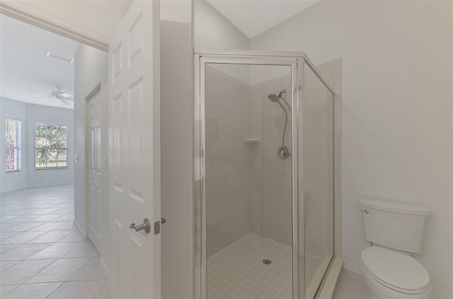 bathroom featuring walk in shower, ceiling fan, tile patterned floors, and toilet