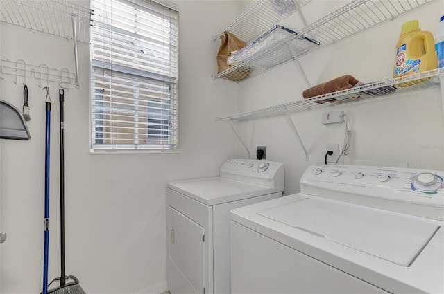 clothes washing area featuring washing machine and dryer