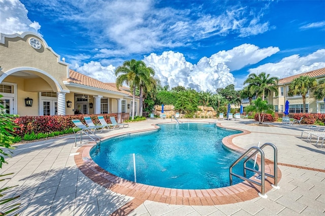 view of pool featuring a patio